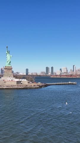 Liberty Statue At Manhattan In New York United States. Hudson River. Port Of New York Scene. Liberty Statue At New York United States. Boat Sailing Background.