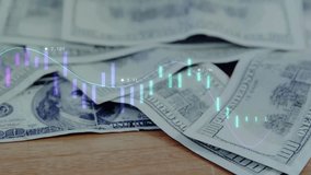 Hand folding $100 bill into tent with line graph and candlesticks oscillating showing market trends. Financial analysis, investment, trading, digital data, stock market, economic growth - Powered by Shutterstock - Get 15% off with code: PIKWIZARD15