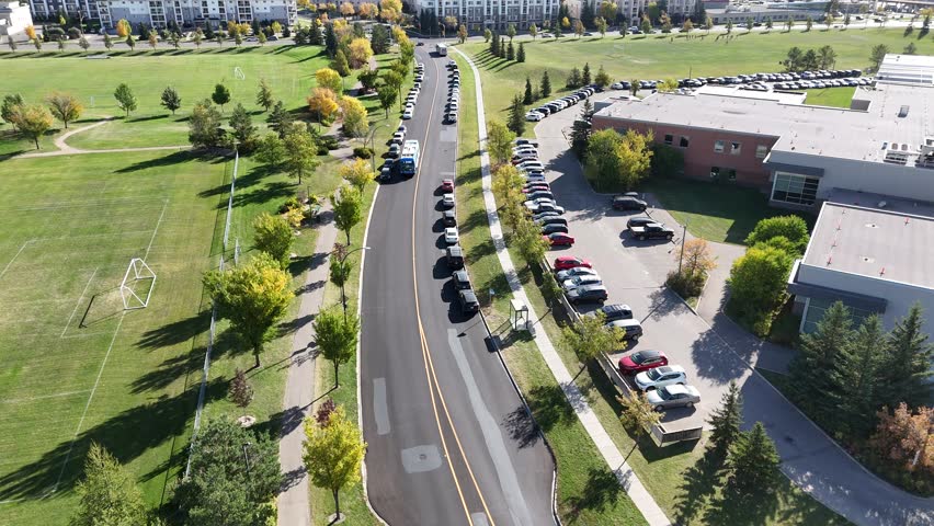 Aerial view of University Heights Saskatoon highlighting schools, recreation areas, and community spaces in 4K.