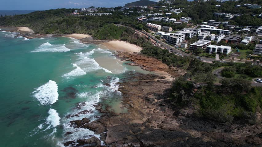 Aerial View Of Numerous Waves Hitting The Rocky Coast Of Beach In Coolum, Sunshine Coast, QLD, Australia.