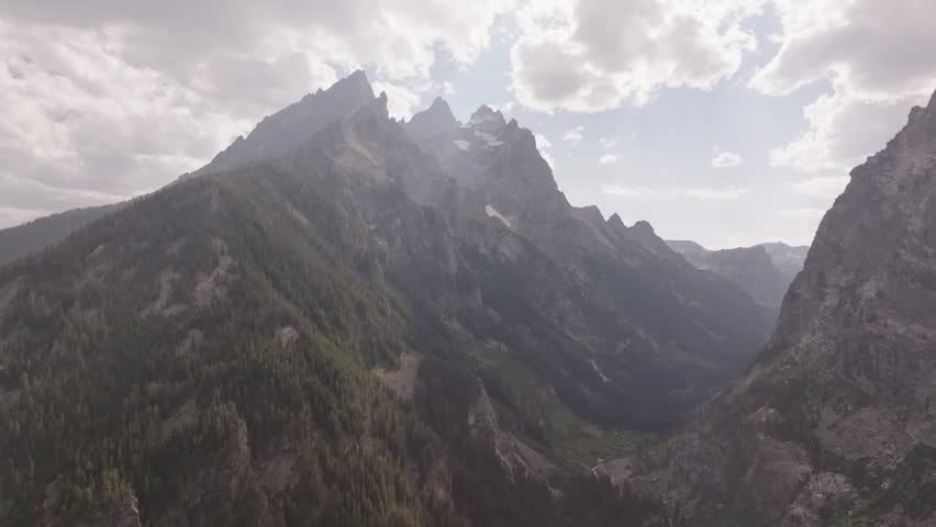 Drone shot of the Teton mountains at sunset in Montana