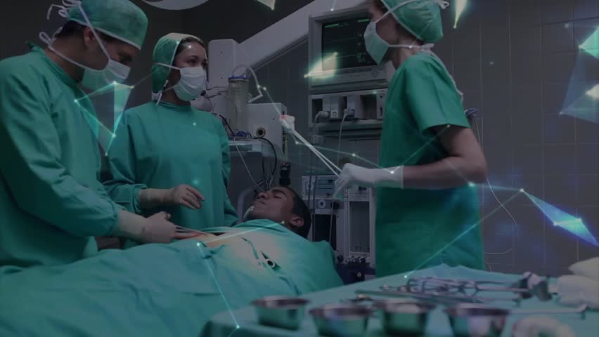 Surgical team conferring, activating holographic globe securing IV and checking vitals for surgery. Medical, teamwork, futuristic, innovation, healthcare, technology, professional - Powered by Shutterstock - Get 15% off with code: PIKWIZARD15