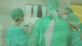 After pointing at X-ray surgical team tracing bone structure and sharing findings in medical prep. Medical, teamwork, diagnostic, clinical, professional, consultative, detailed - Powered by Shutterstock - Get 15% off with code: PIKWIZARD15