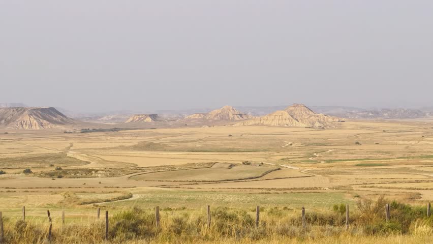 Panoramic Landscape of Bardenas Reales Natural Park, Navarra, Spain, semi-desert badlands, unique geological formations, eroded clay and sandstone