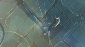 Overhead filming basketball player dribbling three-point arc shooting jump shot to score with grid. Athletic, motion, competition, training, modern, vibrant, energy - Powered by Shutterstock - Get 15% off with code: PIKWIZARD15