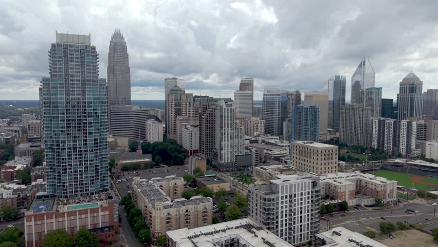 aerial push through buildings in the charlotte nc, north carolina skyline