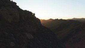 Sun peeking over peaks initiating gold diamond overlay rotating flooding valley to highlight warmth. Mountain, sunrise, geometric, abstract, landscape, dawn, warmth - Powered by Shutterstock - Get 15% off with code: PIKWIZARD15