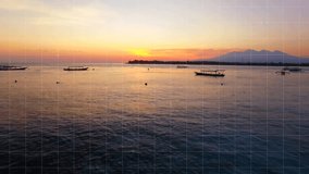 Sun descending driving drone panning, boats drifting, sky deepening into reds before twilight. Seascape, sunset, tranquility, reflective, aerial, scenic, wanderlust - Powered by Shutterstock - Get 15% off with code: PIKWIZARD15