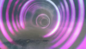 Ring hovering over clouds starting pulsing concentric magenta arcs rotating inward for tunnel depth. Abstract, futuristic, neon, digital, geometric, motion, ambiance - Powered by Shutterstock - Get 15% off with code: PIKWIZARD15