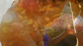 Floral overlay fading and revealing bikini trio dancing on granite boulders for lifestyle marketing. Dance, celebration, beach, leisure, summer, vibrant, outdoor - Powered by Shutterstock - Get 15% off with code: PIKWIZARD15