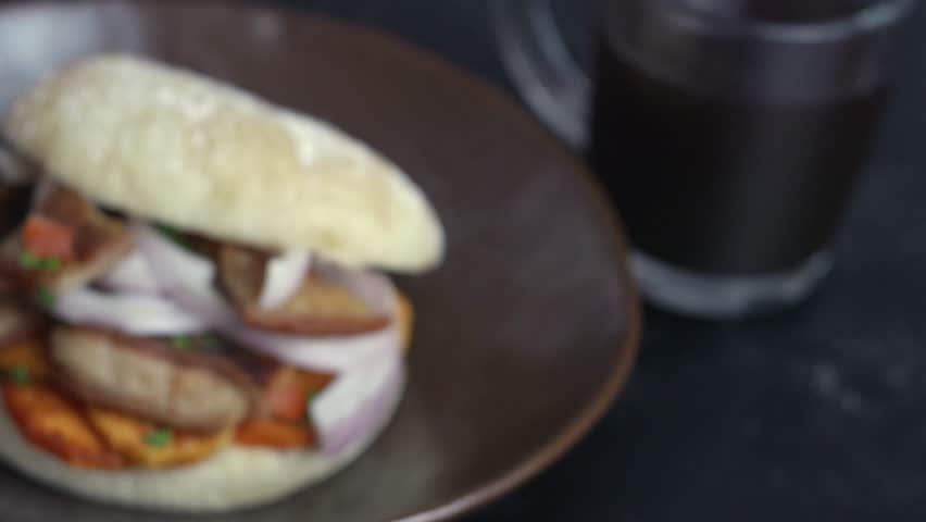 A very popular dish in Peru: Bread with pork rinds and a cup of coffee.