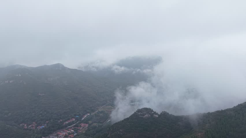 Aerial view of mountains in autumn mist