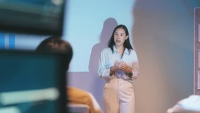 Businesswoman presents a marketing strategy using a ship route map, promoting global product distribution and sales logistics in a corporate setting during a professional presentation. - Powered by Shutterstock - Get 15% off with code: PIKWIZARD15