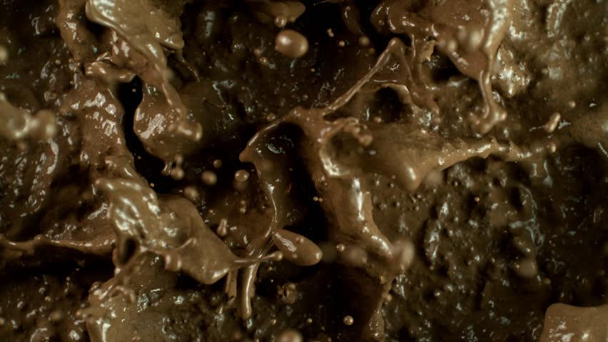 Super Slow Motion Shot of Mud Splashing , Top Shot , Filmed on High Speed Cinematic Camera