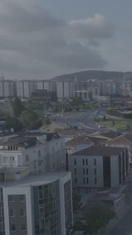 Aerial view of Istanbul streets with Turkish flag, buildings, mountains and daily life