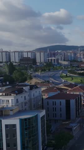 Aerial view of Istanbul streets with Turkish flag, buildings, mountains and daily life