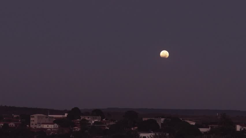 Beautiful lunar eclipse seen from the city of Turmalina Mg near dawn