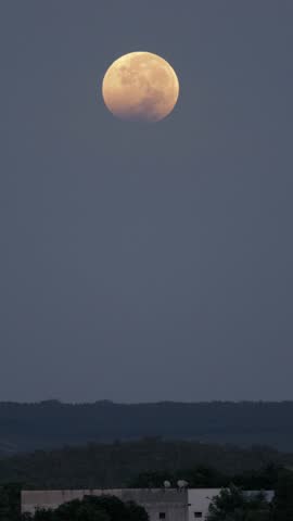 Beautiful lunar eclipse seen from the city of Turmalina Mg near dawn