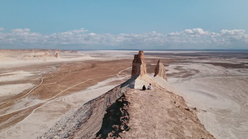Experience the Breathtaking Cliffside Views That Overlook a Vast and Desolate Landscape