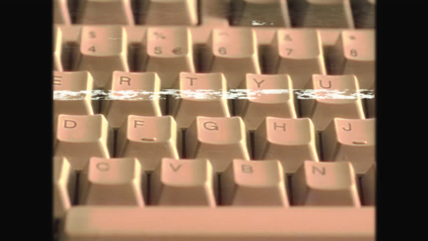 Retro 90s-2000s PC Keyboard Typing with Vintage VHS Effect. Nostalgic Hands on Old Computer Keyboard, Classic Technology Aesthetic, Grainy Cassette Video Style, Historical Computing Scene