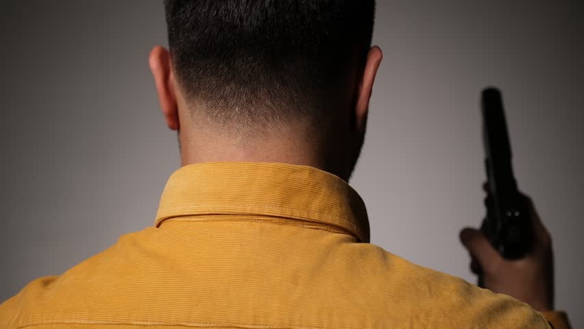 Man Threatening Another with a Handgun