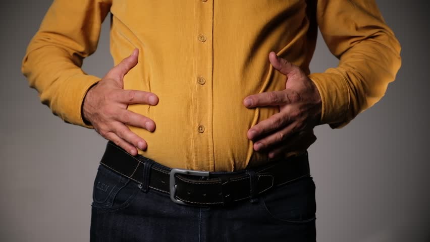 Middle-Aged Man with Excess Belly Fat