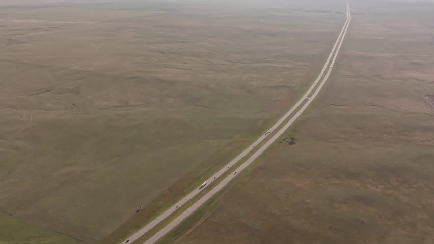 Superwide drone shot of a road in the American desert