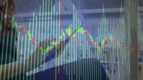 Office pro tapping tablet and scrolling translucent candlestick chart overlay for finance analysis. Financial data, analytics, digital interface, modern workplace, professional, technology, enterprise - Powered by Shutterstock - Get 15% off with code: PIKWIZARD15