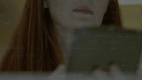 Mature woman lifting tablet revealing financial overlay and candlestick bars for analyzing trends. Data visualization, analysis, technology, finance, investment, minimalism, concentration - Powered by Shutterstock - Get 15% off with code: PIKWIZARD15