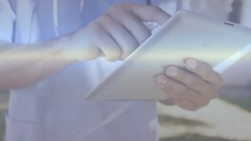 doctor tapping and swiping tablet revealing bars graphs code globe icons visualizing health data. Medical, technology, data, analytics, digital, healthcare, visualization - Powered by Shutterstock - Get 15% off with code: PIKWIZARD15