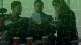 Team analyzing tablets on sofa as grid overlay appearing animating red line chart during analysis. Collaboration, teamwork, data, analytics, business, digital, modern - Powered by Shutterstock - Get 15% off with code: PIKWIZARD15