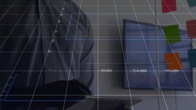 Man tapping tablet in office causing financial charts appearing and updating for reviewing data. Technology, data visualization, business, innovation, analytics, digital, interface - Powered by Shutterstock - Get 15% off with code: PIKWIZARD15