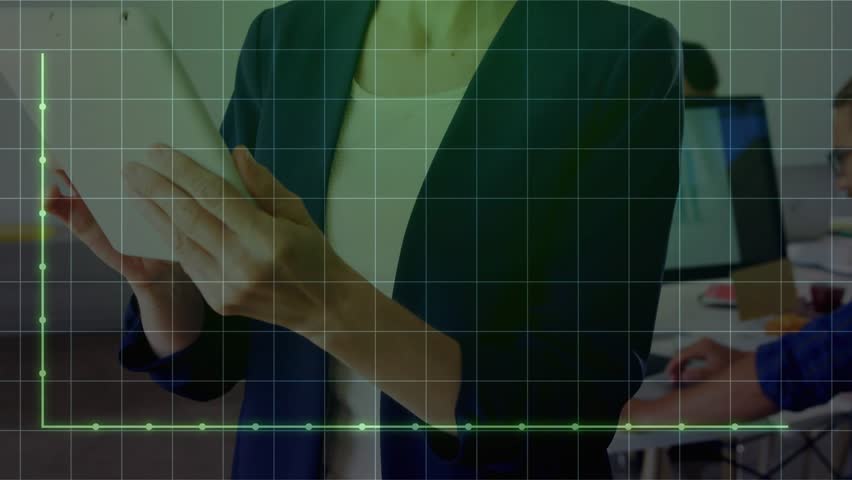 Businesswoman swiping and tapping tablet causing green graph rising spiking while coworker typing. Technology, data analysis, digital, professional, innovation, workspace, minimalism - Powered by Shutterstock - Get 15% off with code: PIKWIZARD15