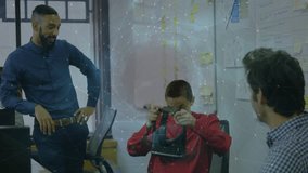 Business worker adjusting VR headset and exploring environment as colleagues watching whiteboard. Technology, innovation, teamwork, collaboration, modern, professional, immersive - Powered by Shutterstock - Get 15% off with code: PIKWIZARD15