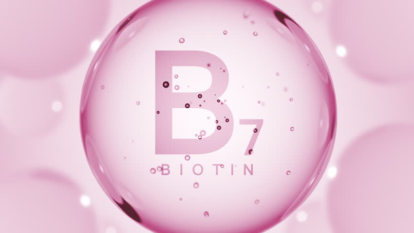 A pink glossy sphere with vitamin B7. Biotin pill capsule. Abstract 3D bubble drop background