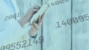 Mid-adult woman tapping tablet screen outdoors for business data review, numeric overlays animating. Technology, data, analytics, professional, outdoor, modern, communication - Powered by Shutterstock - Get 15% off with code: PIKWIZARD15