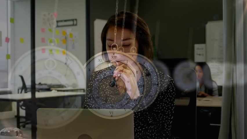 Woman tapping keyboard in business causing swirling clock overlays while calling and tracking time. Professional, time management, modern, productivity, digital, corporate, sleek - Powered by Shutterstock - Get 15% off with code: PIKWIZARD15