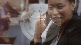 Businesswoman hearing ringing phone with clock tracking hanging up business call reading messages. Professional, corporate, modern, teamwork, communication, collaboration, technology - Powered by Shutterstock - Get 15% off with code: PIKWIZARD15