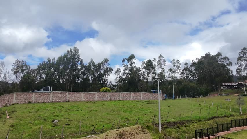 Residential buildings in La Calera, Cundinamarca, Colombia. Modern housing complexes surrounded by mountains and green landscapes, showing the contrast between urban development and natural 