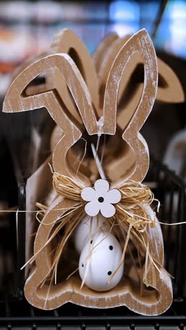 Easter sale. Different funny Easter bunny figurines, statuettes. shopping of Easter decoration for home. Easter decorations and gifts in the shop, supermarket.