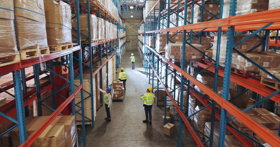 Logistics, cargo and above with people in warehouse for package distribution, shipping and inventory. Supply chain, collaboration and courier depot with employees in factory for ecommerce delivery