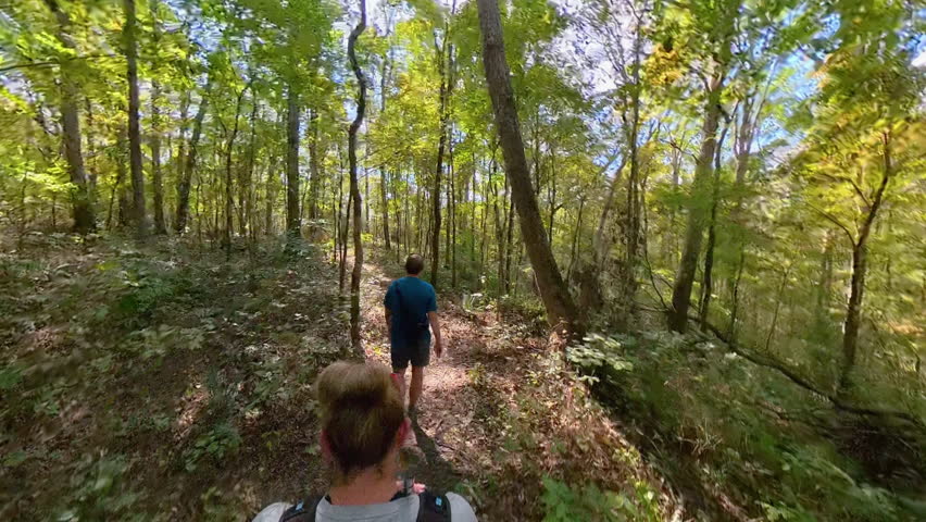 Overhead of Couple Hiking in Kentucky Forest in Mammoth Cave national Park