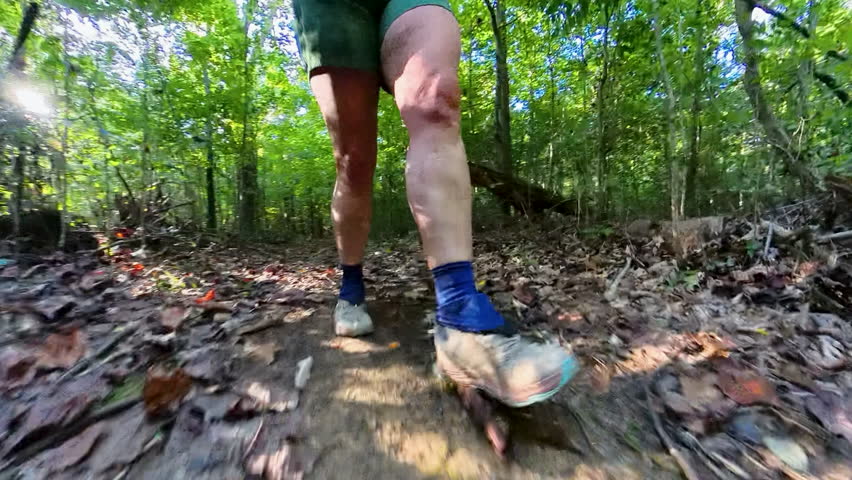 Womans Foot Steps on Dirt Trail in Mammoth Cave National Park