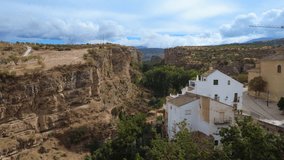 4K aerial drone video of the valley at Alhama de Granada with rolling hills, farmland, and surrounding Andalusian countryside. - Powered by Shutterstock - Get 15% off with code: PIKWIZARD15