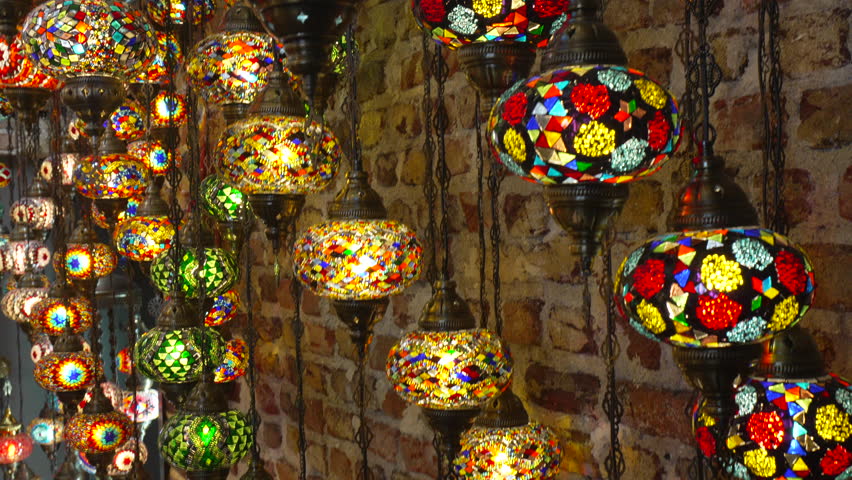 Lamps, Turkey Bazaar, Mosaic Glass: Colorful Turkish mosaic glass lamps hanging in a bustling bazaar, showcasing traditional craftsmanship. - Powered by Shutterstock - Get 15% off with code: PIKWIZARD15