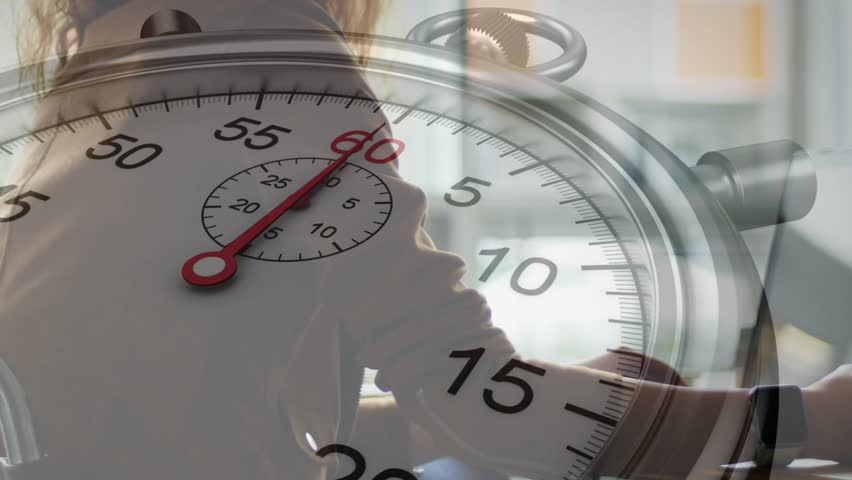 Stopwatch appearing at 58s mark initiating woman leaning forward typing on laptop showing tech time. Timing, productivity, focus, efficiency, workspace, digital, minimalism