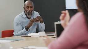 Man listening to peer presenting business brief driving moving subscribe and social icons grouping. Professional, collaboration, digital, communication, technology, modern, networking - Powered by Shutterstock - Get 15% off with code: PIKWIZARD15