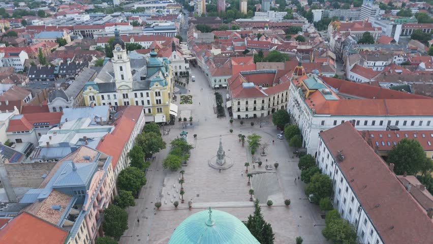 Orbiting Széchenyi Square in Pécs, with the mosque, Town Hall, and historic cityscape in view