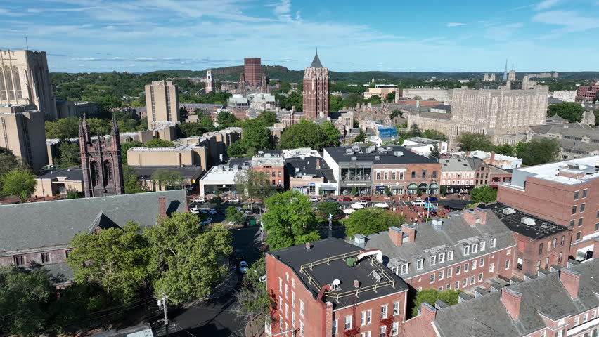 Yale University Spires And Broadway Road Traffic In New Haven, Connecticut, United States. Aerial Drone Shot