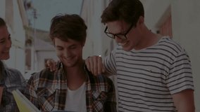 Students walking sunlit street conversing and activating tech sphere visualizing network technology. Collaboration, networking, innovation, outdoor, casual, friendship, technology - Powered by Shutterstock - Get 15% off with code: PIKWIZARD15